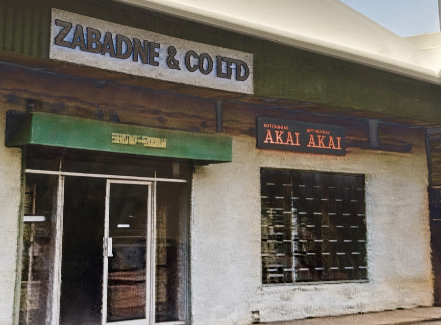 Shopfront signage reading Zabadne & Co Ltd, with an Akai sign alongside